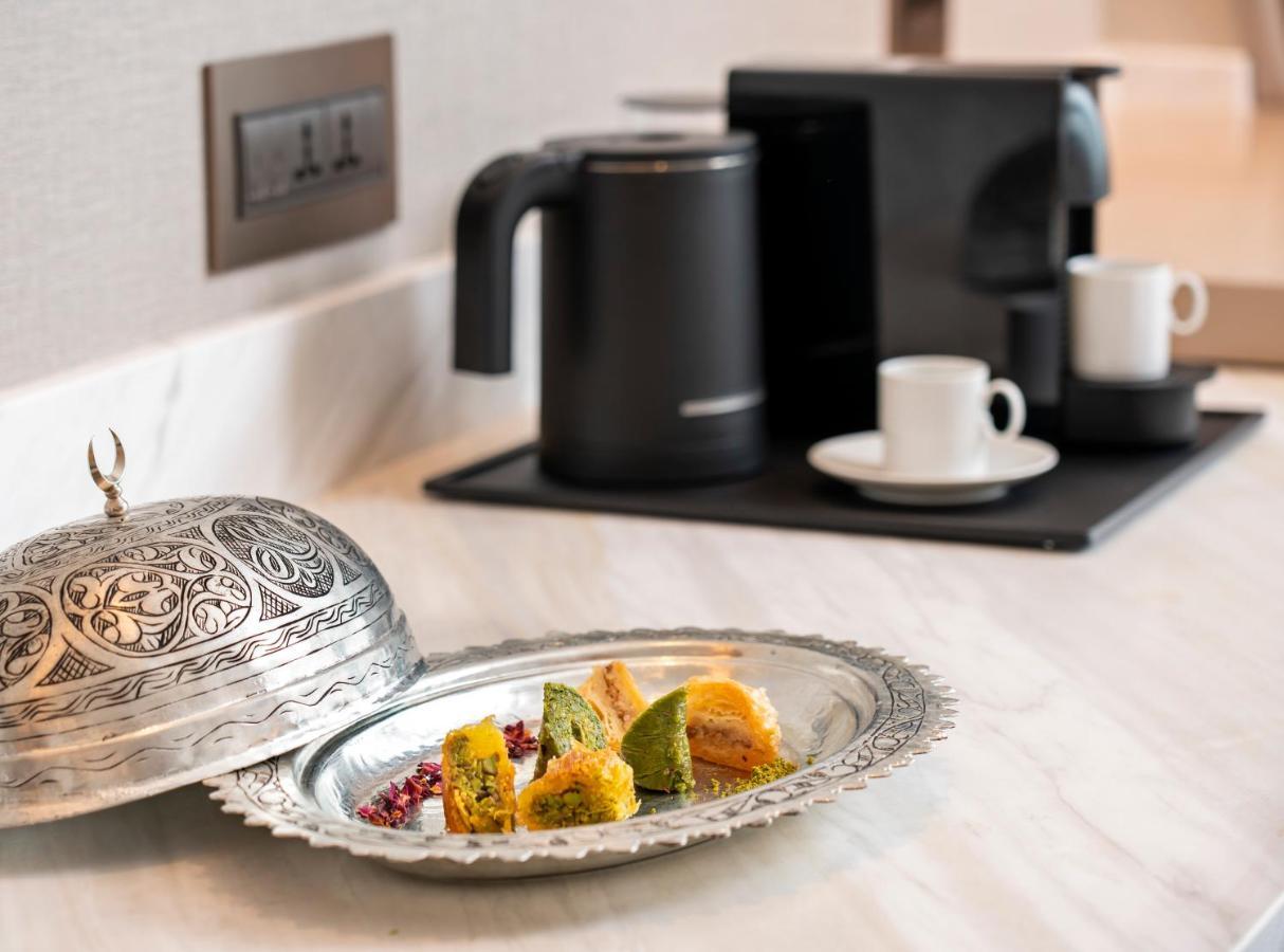 Hotel Address Istanbul Exterior foto A coffee machine in a hotel room